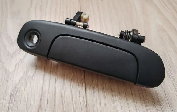 Mazda 323 F Front door exterior handle