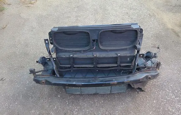 Radiator support slam panel
