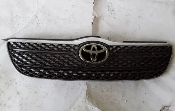 Toyota Corolla E120 E130 Front bumper upper radiator grill 531111A480