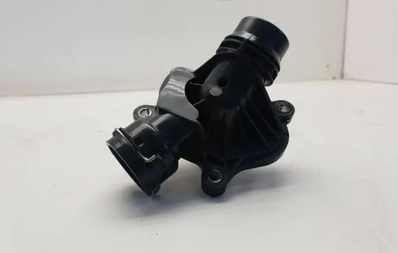 Thermostat/thermostat housing