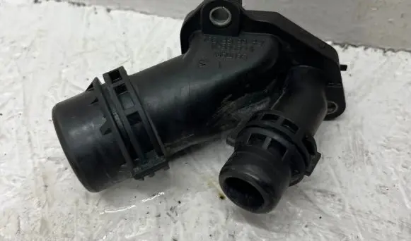Thermostat/thermostat housing