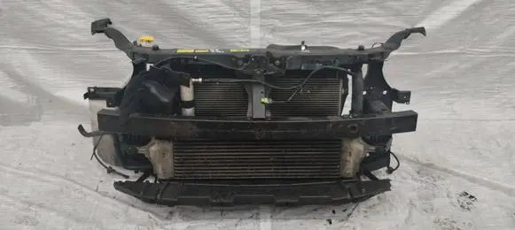 Radiator support slam panel