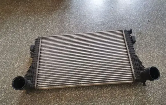 Volkswagen Golf V Intercooler radiator 1K0145803E