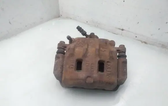 Subaru Forester SF Front brake caliper AD43T4317