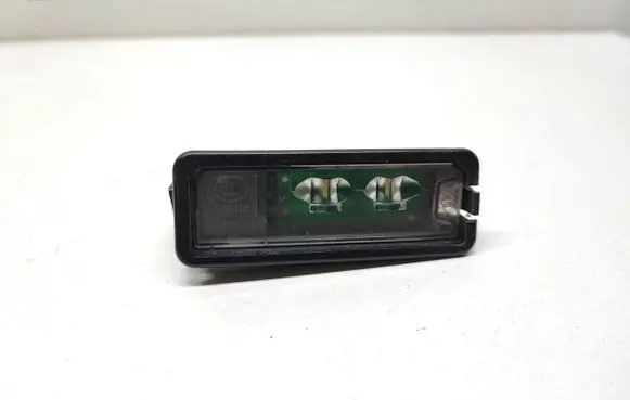 Volkswagen PASSAT CC Number plate light 1K8943021C