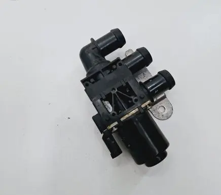 Coolant heater control valve