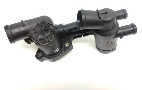 Thermostat/thermostat housing
