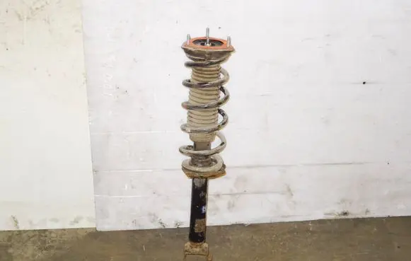 Infiniti Q50 Front shock absorber with coil spring 562104GE0D