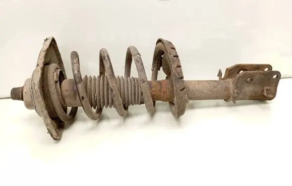 Front shock absorber with coil spring