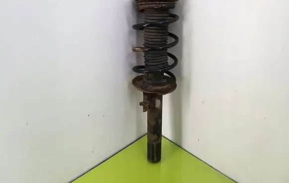 Volkswagen Golf V Front shock absorber with coil spring 1K0413031BE