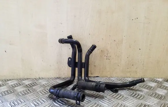 Skoda Octavia Mk3 (5E) Engine coolant pipe/hose 04L121064G