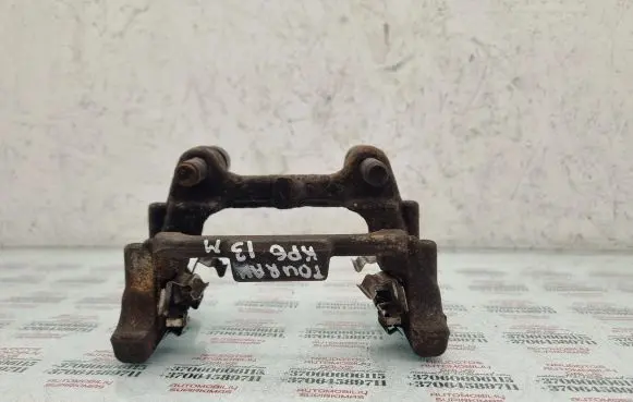 Volkswagen Touran II Brake caliper pad carrier rear 