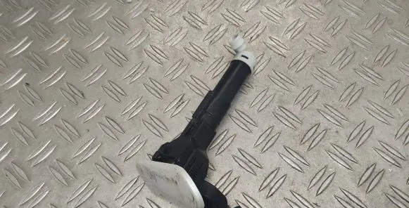 Headlight washer spray nozzle