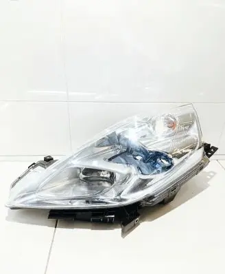 Nissan Leaf I (ZE0) Headlight/headlamp E1313057L A1K3100001 DACA21D10684