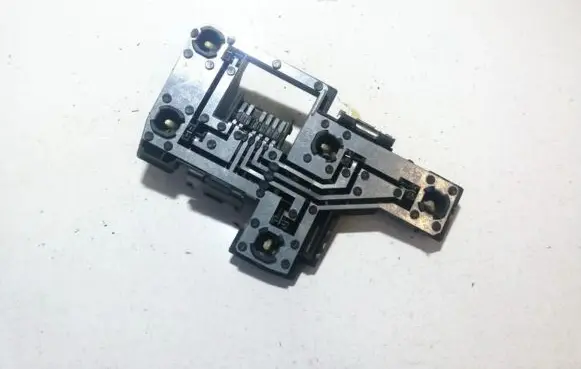 Tail light bulb cover holder