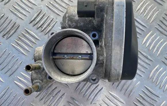 Volkswagen Golf V Throttle valve 06F133062 408238327003 05402
