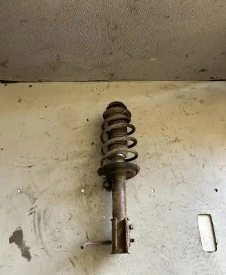 Toyota Yaris Front shock absorber with coil spring