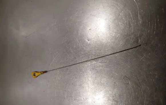 Oil level dip stick