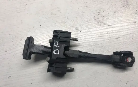 Volvo V50 Front door check strap stopper