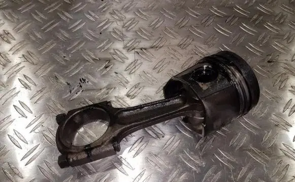 Piston with connecting rod