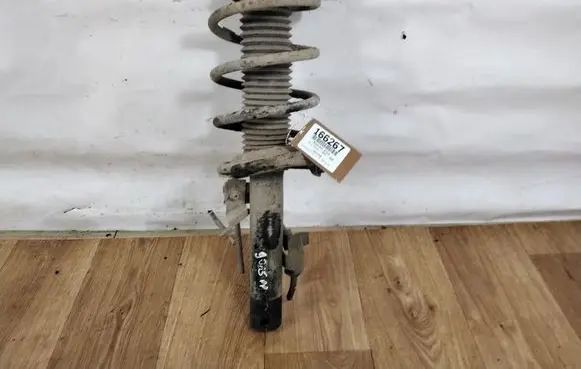 Ford Escort Front shock absorber with coil spring