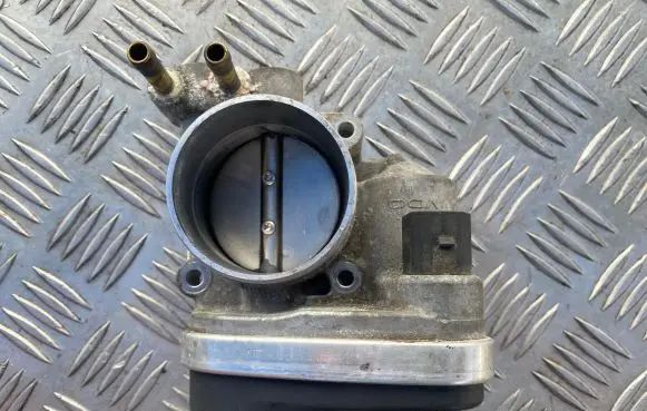 Volkswagen Touran I Throttle valve 06F133062 408238327003 034721