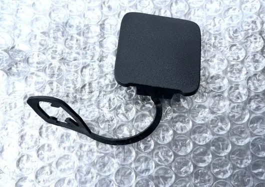 Rear bumper row hook cap/cover