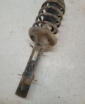 Volkswagen Golf IV Front shock absorber with coil spring 1J0413031AE