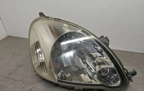 Toyota Yaris Headlight/headlamp 811100D08000 89007613