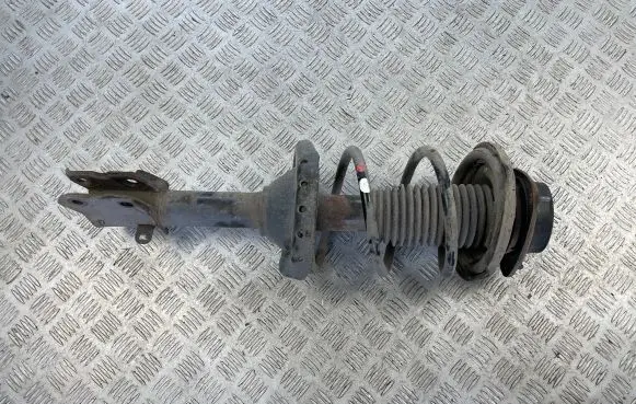 Subaru Outback Front shock absorber with coil spring 20310AJ04B