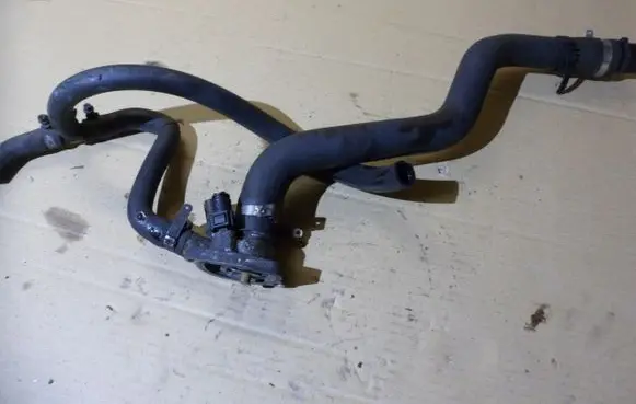 Thermostat/thermostat housing