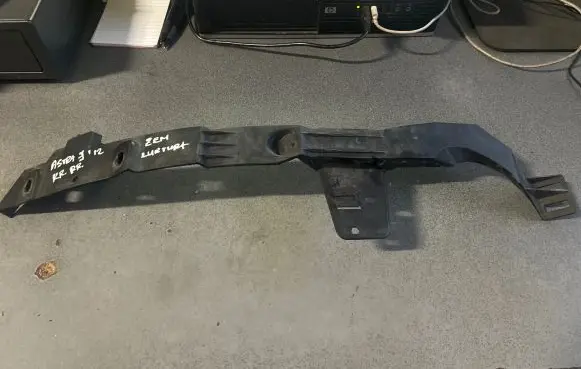 Opel Astra J Headlight/headlamp mounting bracket 13287639