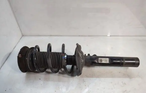 Volkswagen Golf VII Front shock absorber with coil spring 5Q0413023GQ