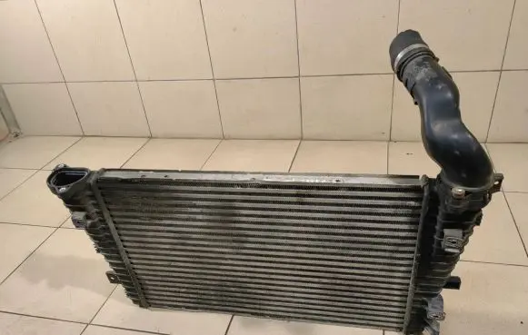 Opel Zafira B Intercooler radiator 13223395