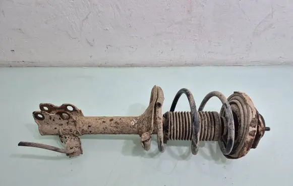 Nissan X-Trail T30 Front shock absorber with coil spring 