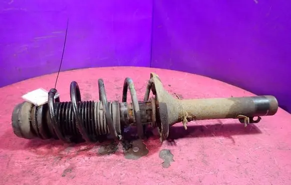 Volkswagen Golf IV Front shock absorber with coil spring