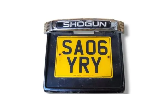 Mitsubishi Pajero Trunk door license plate light bar MN117363