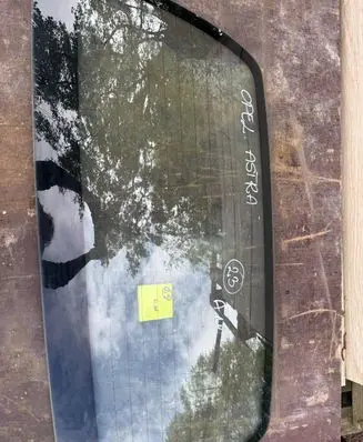 Opel Astra G Rear vent window glass 43R000980