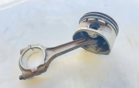 Piston with connecting rod