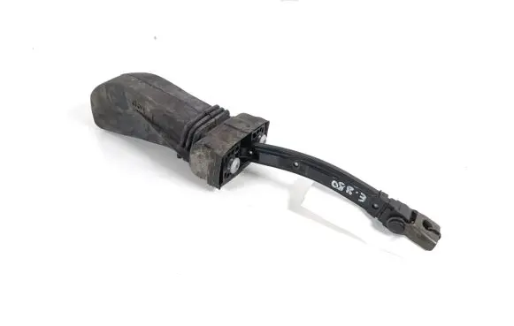 Front door check strap stopper