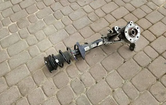 Volkswagen Golf VII Front shock absorber with coil spring 5Q0412037JL