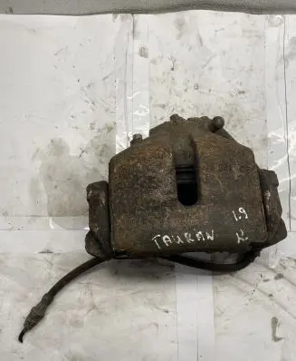 Volkswagen Touran I Front brake caliper