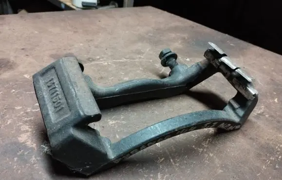 Dodge Durango II Front Brake Caliper Pad/Carrier 13711501