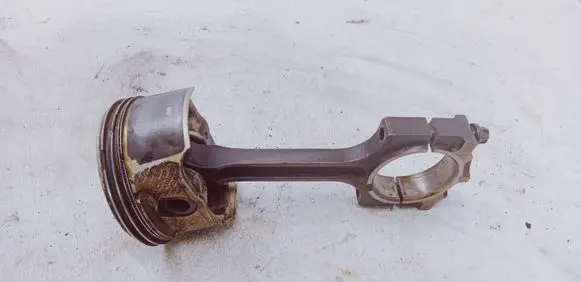Piston with connecting rod