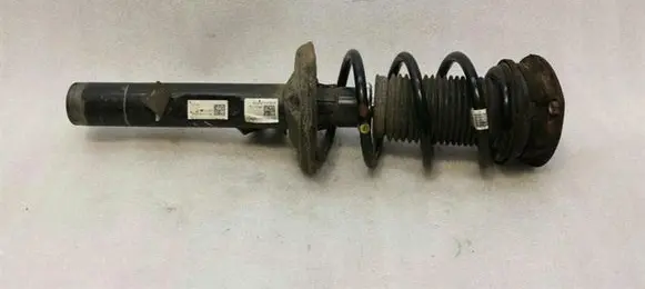 Volkswagen Golf VII Front shock absorber with coil spring