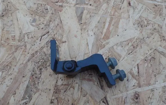 Rear door upper hinge
