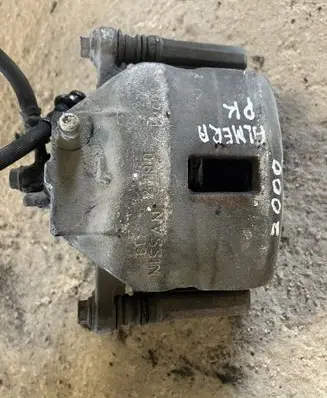Nissan Almera N16 Front brake caliper