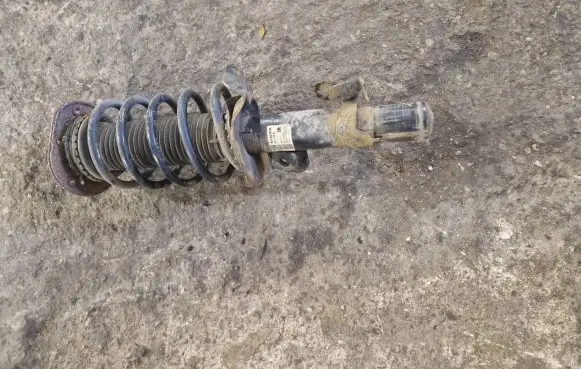 Volvo V70 Front shock absorber with coil spring 31317810