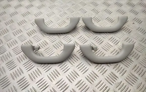 Volkswagen Tiguan A set of handles for the ceiling 1K0857607N 1K0857607M