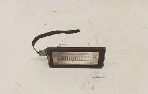 Opel Astra J Number plate light GM13575641